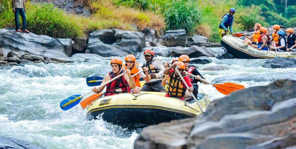 Adventurous group white water rafting in Kitulgala, Sri Lanka.