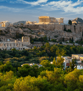 Acropolis Panoramic view of the Acropolis, showcasing the Parthenon and ancient ruins against a clear blue sky in Athens, Greece.